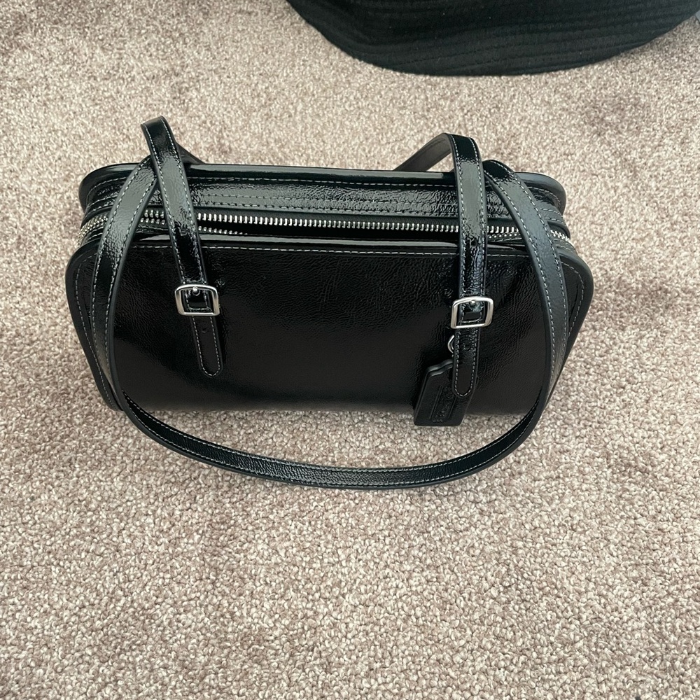 Coach Swing Zip